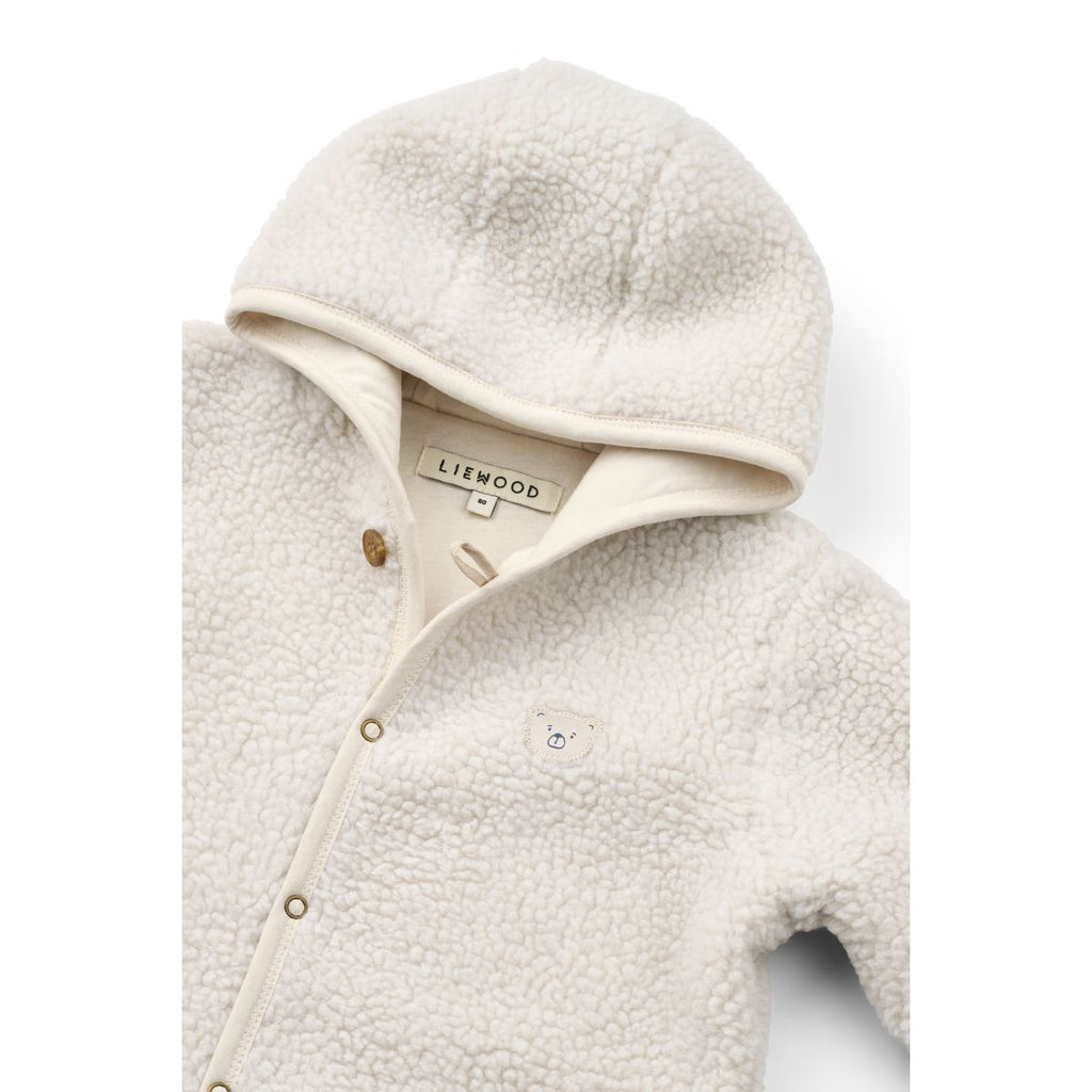 Grenouillère bébé à capuche en molleton de polyester recyclé avec poignets et chevilles repliables et ouverture à boutons-pression pour les sorties en poussette