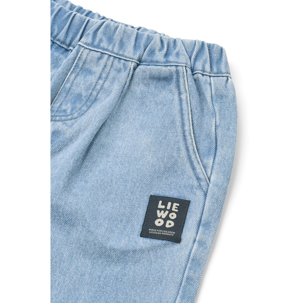 Pantalon en jean de coton brodé coloré bleu clair décontracté avec jambes incurvées pour tenues décontractées d'enfants