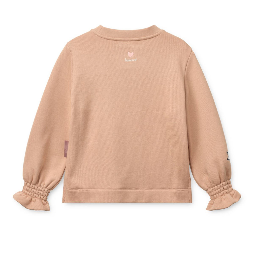 Sweat-shirt brodé en coton biologique Tuscany pâle avec poignets à volants et col rond pour le confort quotidien des enfants