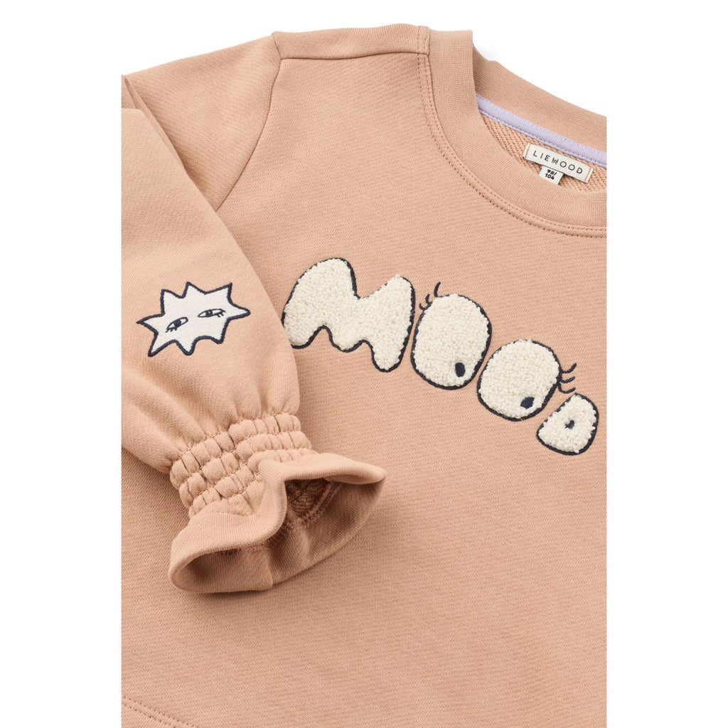 Sweat-shirt brodé en coton biologique Tuscany pâle avec poignets à volants et col rond pour le confort quotidien des enfants